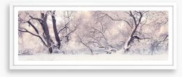Soft snow branches Framed Art Print 128794197