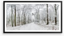 Into the snow forest Framed Art Print 136150323