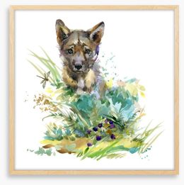 Wolf cub in the grass