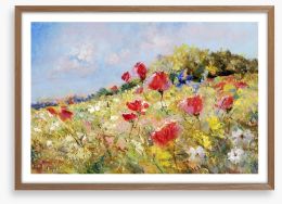 Poppies bloom through Framed Art Print 38756901