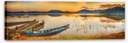 Rowing boats at sundown Stretched Canvas 44669436