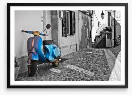 Moped in cobblestone alley
