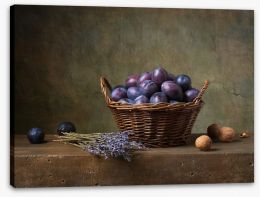 Plums in a basket Stretched Canvas 57388246