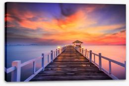 Fiery sunset across the pier Stretched Canvas 61181973