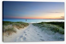 Sandy beach trail at sundown Stretched Canvas 75746716