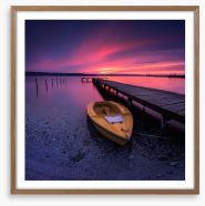 Sunset glow over the pier Framed Art Print 133760017