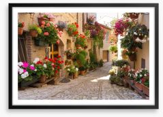 Italian alley with flowers Framed Art Print 53374967