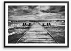 The old jetty and the storm Framed Art Print 66253310