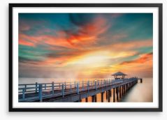 Dramatic pier sunset Framed Art Print 71800374