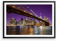 Manhattan under a purple sky Framed Art Print 81069964